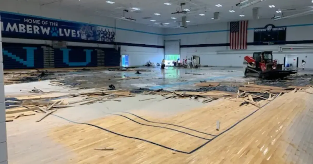 After the School's Flood Falls to Repair the Gym Floor