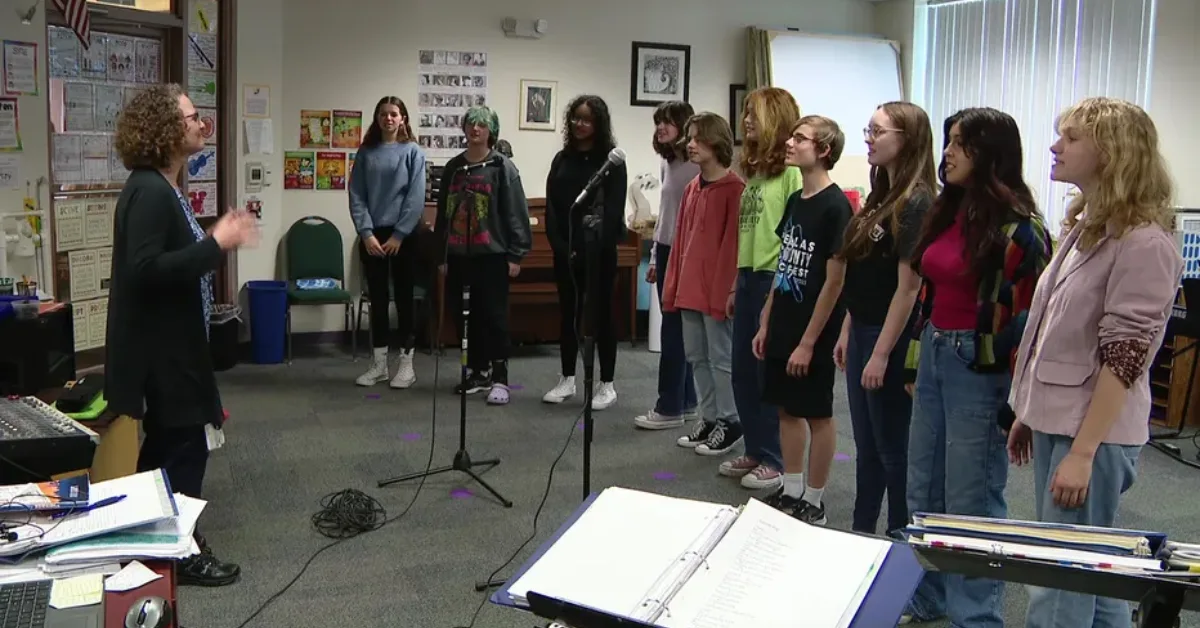 Students at Academie da Vinci Charter School for the Arts and Technology take part in a singing class.