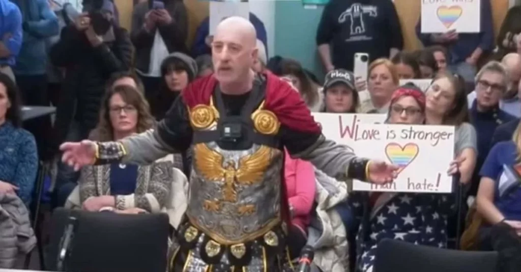Father Dresses As Julius Caesar To Protest Teacher's Gender-fluid Attire At School Board Meeting